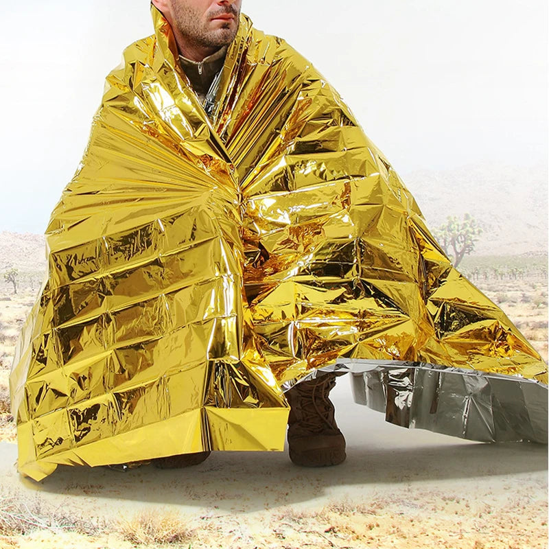 Manta Térmica de Emergencia Impermeable y Cortaviento para Supervivencia, Camping y Primeros Auxilios - Survivalia
