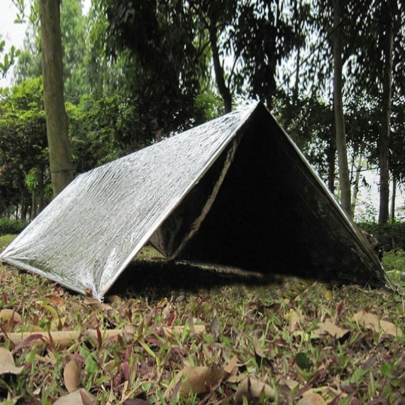 Manta Térmica de Emergencia Impermeable y Cortaviento para Supervivencia, Camping y Primeros Auxilios - Survivalia